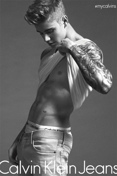 Justin Bieber showing abs