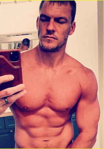 Alan Ritchson Shares a Shirtless Photo From the Set of 'Reacher